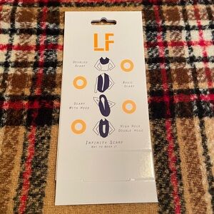 Infinity Scarf. Beige plaid from the Love of Fashion Collection. NWT